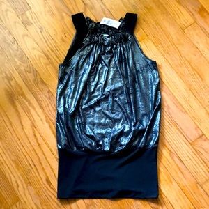 Metallic tank